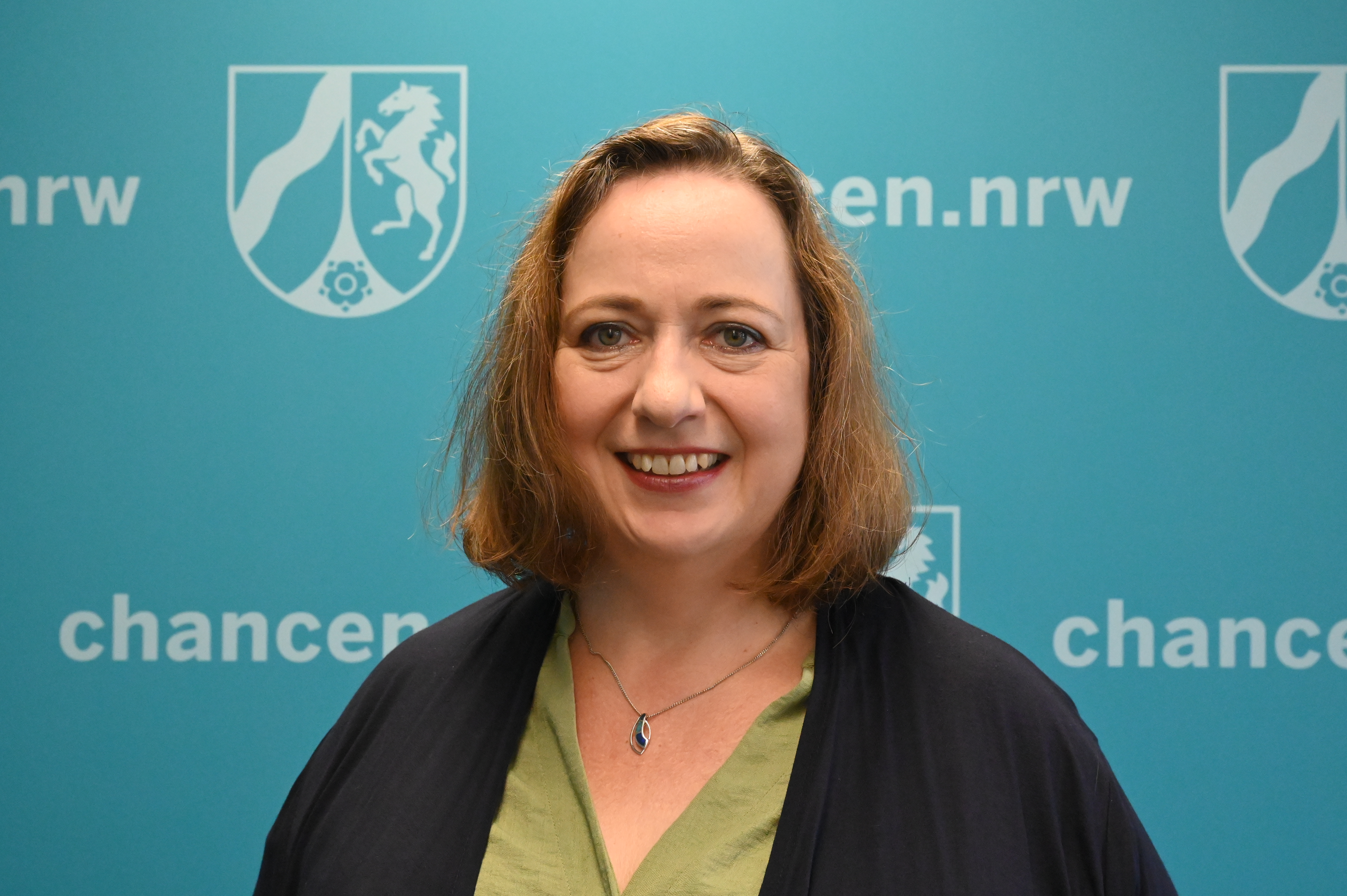 Frau Kissel Braune Haare Pressestelle